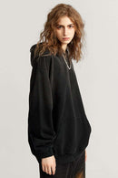 Ultra-Heavyweight Gradient-Wash Distressed Hoodie in Active Black - three-quarter front modeled view
