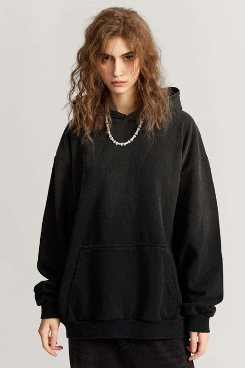 Ultra-Heavyweight Gradient-Wash Distressed Hoodie in Active Black - front modeled view