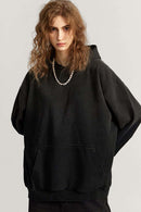 Ultra-Heavyweight Gradient-Wash Distressed Hoodie in Active Black - front modeled close-up
