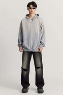 Ultra-Heavyweight Gradient-Wash Distressed Hoodie in Medium Gray - full-length front modeled view
