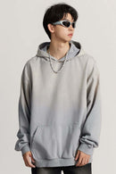 Ultra-Heavyweight Gradient-Wash Distressed Hoodie in Medium Gray - three-quarter front modeled view