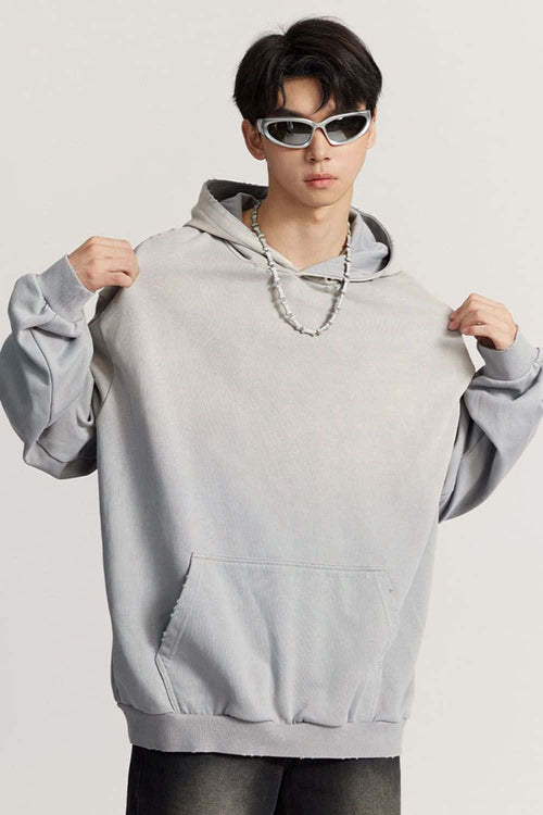 Ultra-Heavyweight Gradient-Wash Distressed Hoodie in Medium Gray - front modeled close-up