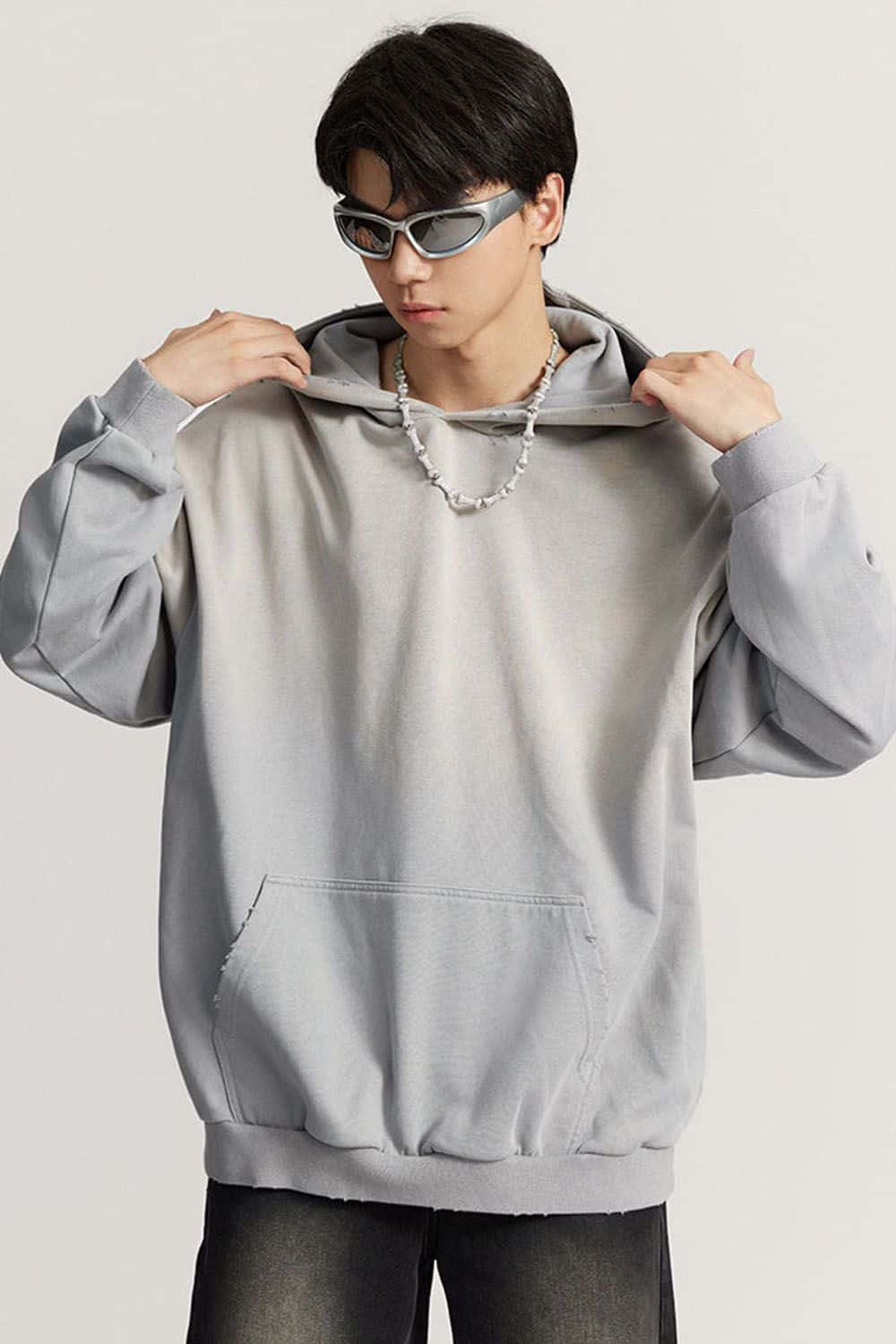 Ultra-Heavyweight Gradient-Wash Distressed Hoodie in Medium Gray - front modeled close-up