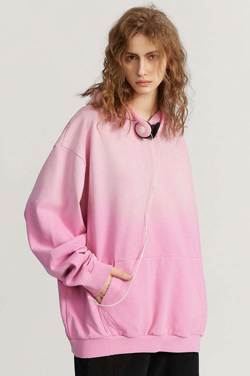 Ultra-Heavyweight Gradient-Wash Distressed Hoodie in Rose Pink - three-quarter front modeled view