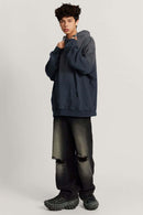 Ultra-Heavyweight Gradient-Wash Distressed Hoodie in Royal Blue - full-length front modeled view