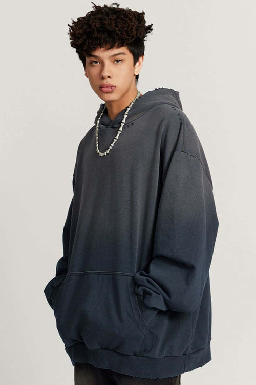 Ultra-Heavyweight Gradient-Wash Distressed Hoodie in Royal Blue - three-quarter front modeled view