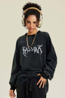 Washed Hand-Painted Graphic Relaxed Long-Sleeve Cotton T-Shirt in Fried Snowflakes - front modeled view