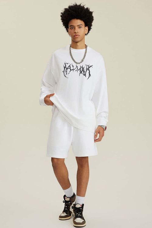 Washed Hand-Painted Graphic Relaxed Long-Sleeve Cotton T-Shirt in White - full-length front modeled view