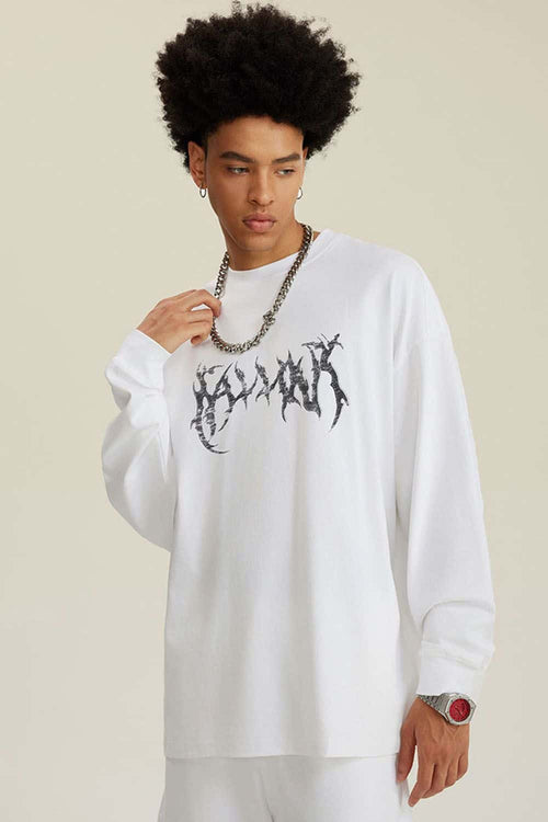 Washed Hand-Painted Graphic Relaxed Long-Sleeve Cotton T-Shirt in White - front modeled view