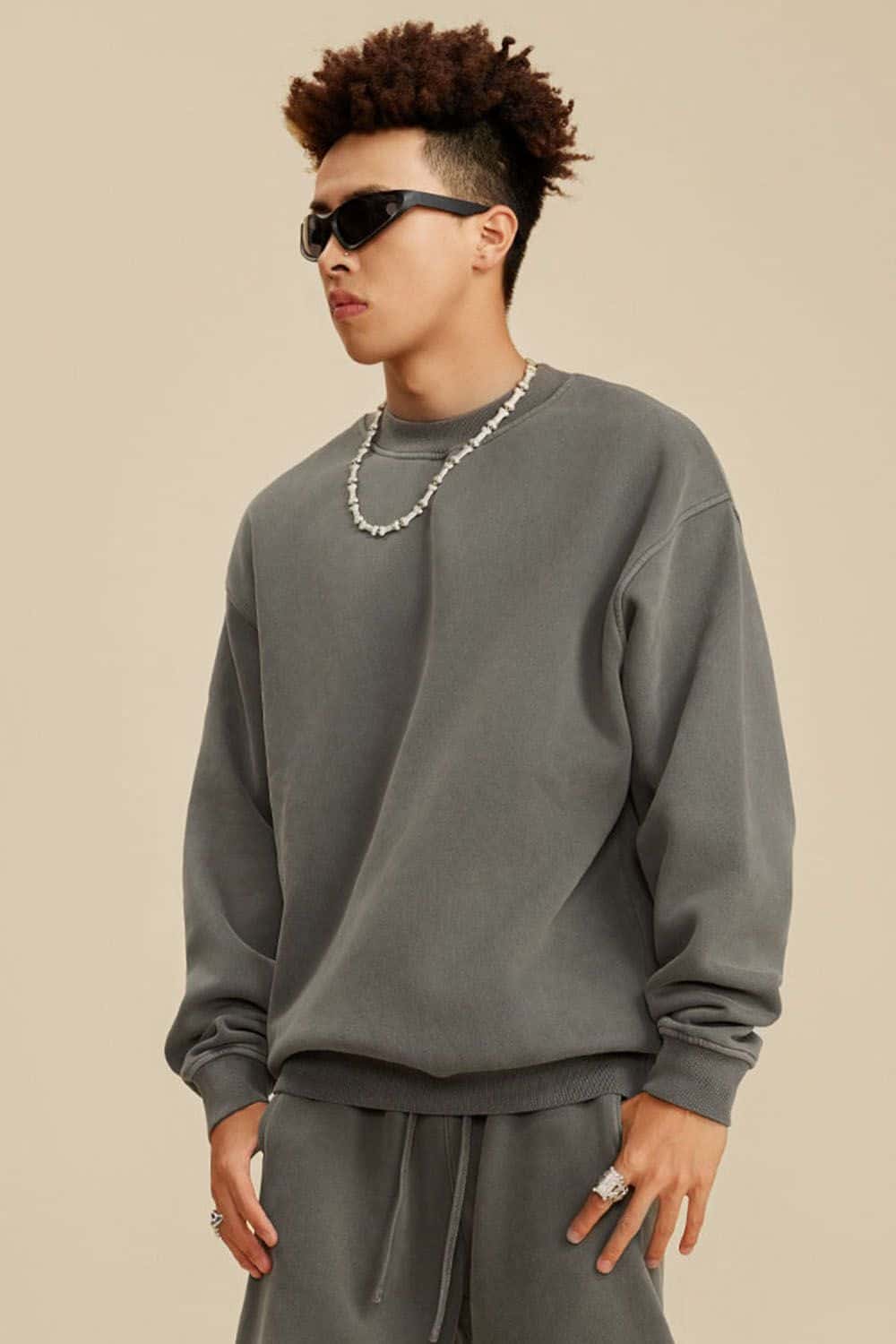 Washed Fleece-Lined Relaxed Crew-Neck Sweatshirt in Coffee - three-quarter front modeled view