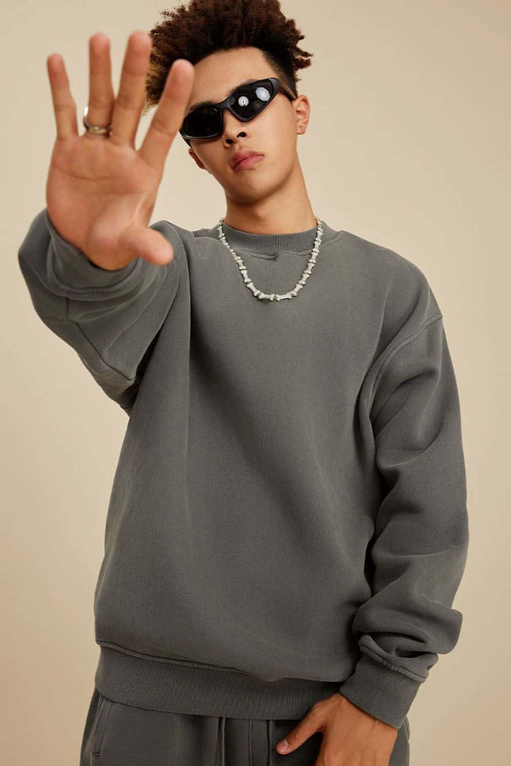 Washed Fleece-Lined Relaxed Crew-Neck Sweatshirt in Coffee - front modeled close-up