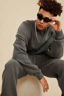 Washed Fleece-Lined Relaxed Crew-Neck Sweatshirt in Coffee - three-quarter front modeled view
