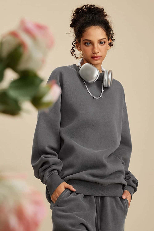 Washed Fleece-Lined Relaxed Crew-Neck Sweatshirt in Dark Gray - three-quarter front modeled view