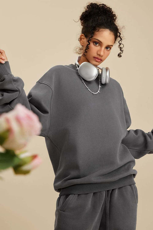 Washed Fleece-Lined Relaxed Crew-Neck Sweatshirt in Dark Gray - front modeled close-up