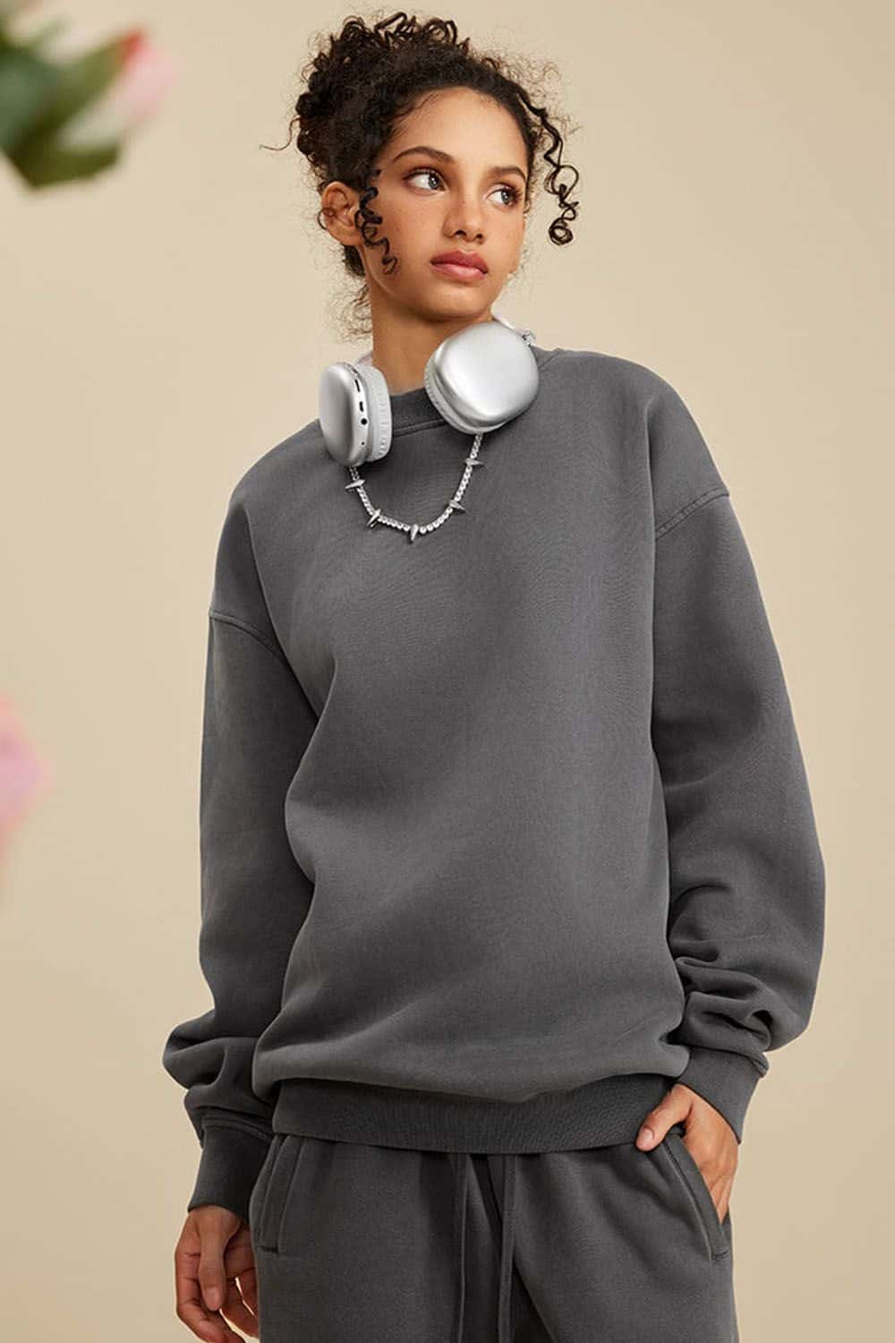 Washed Fleece-Lined Relaxed Crew-Neck Sweatshirt in Dark Gray - front modeled close-up