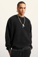Washed Fleece-Lined Relaxed Crew-Neck Sweatshirt in Fried Snowflakes - three-quarter front modeled view