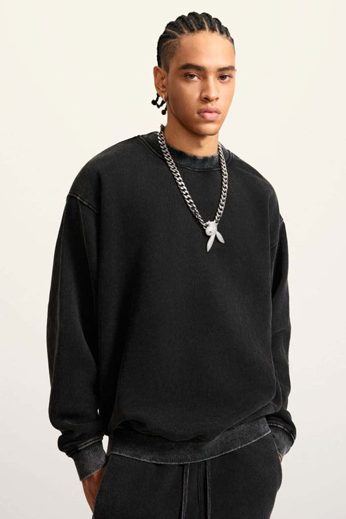Washed Fleece-Lined Relaxed Crew-Neck Sweatshirt in Fried Snowflakes - three-quarter front modeled view