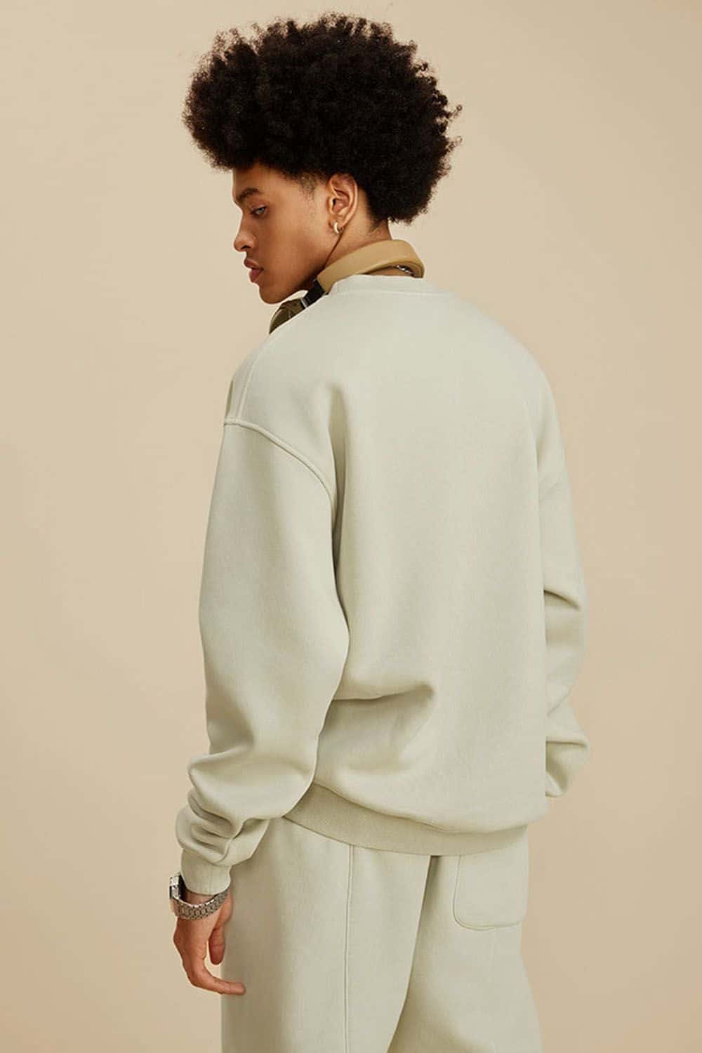 Washed Fleece-Lined Relaxed Crew-Neck Sweatshirt in Gray Apricot - back modeled view