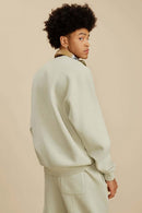 Washed Fleece-Lined Relaxed Crew-Neck Sweatshirt in Gray Apricot - back modeled view
