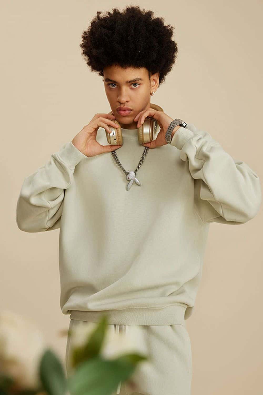 Washed Fleece-Lined Relaxed Crew-Neck Sweatshirt in Gray Apricot - three-quarter front modeled view