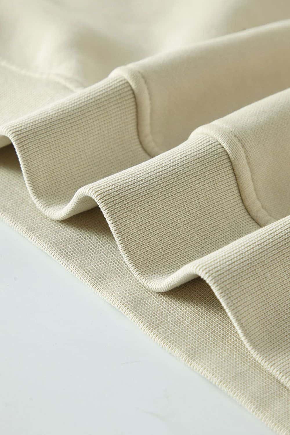 Washed Fleece-Lined Relaxed Crew-Neck Sweatshirt in Gray Apricot - product detail close-up