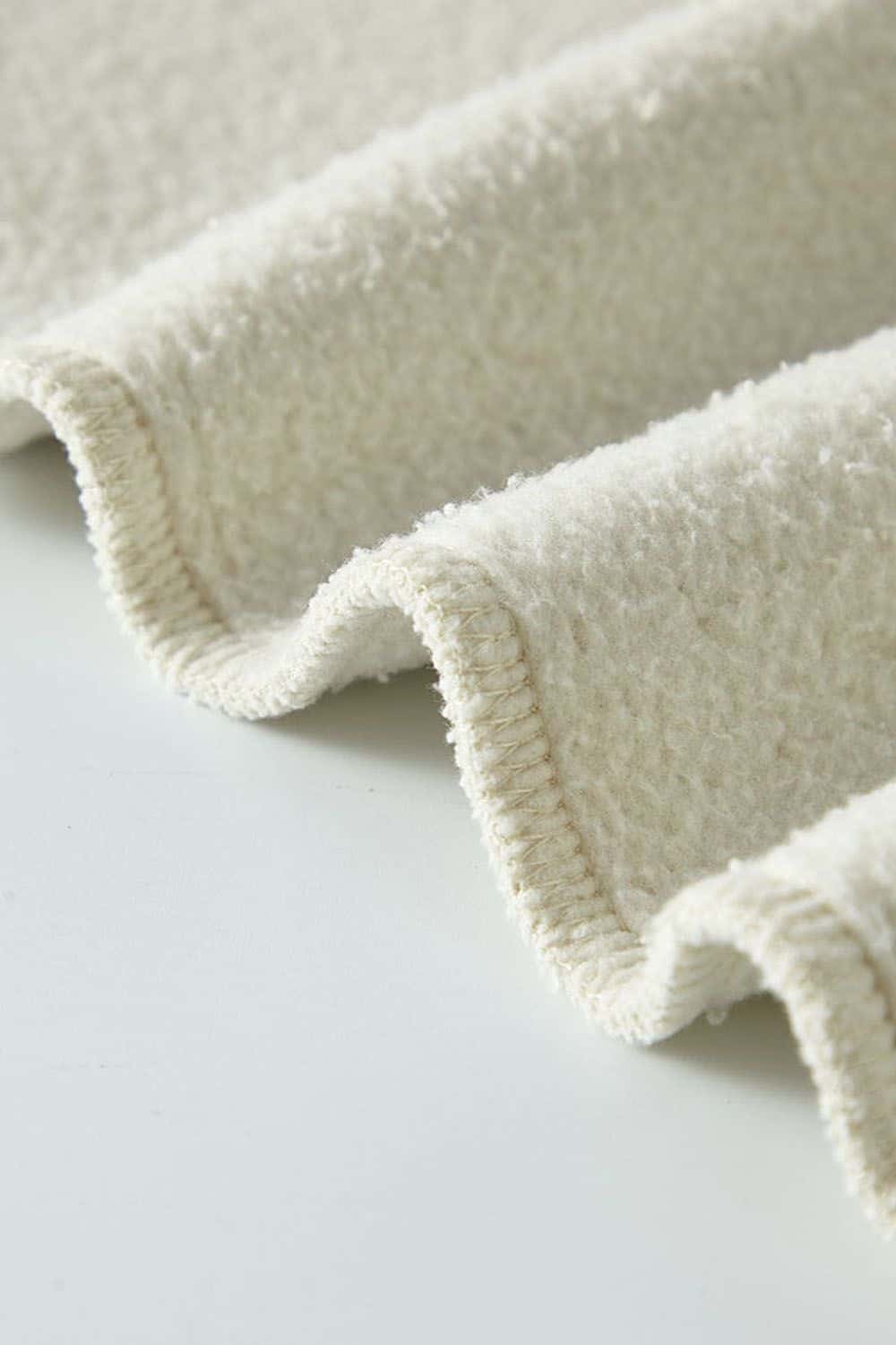Washed Fleece-Lined Relaxed Crew-Neck Sweatshirt in Gray Apricot - fabric texture close-up