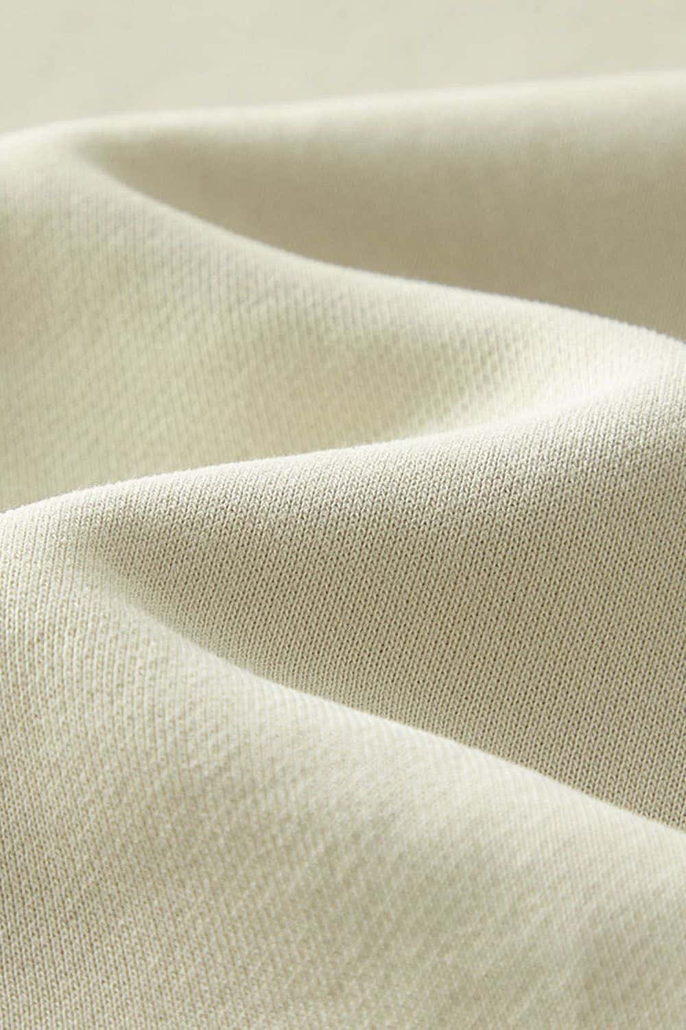 Washed Fleece-Lined Relaxed Crew-Neck Sweatshirt in Gray Apricot - fabric texture close-up