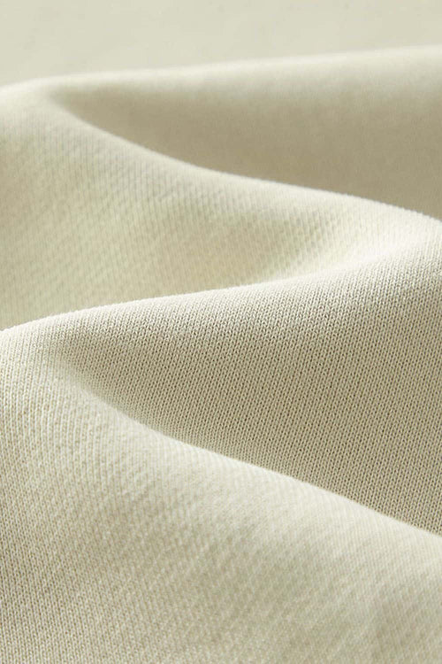 Washed Fleece-Lined Relaxed Crew-Neck Sweatshirt in Gray Apricot - fabric texture close-up