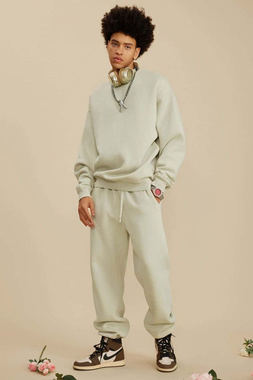 Washed Fleece-Lined Relaxed Crew-Neck Sweatshirt in Gray Apricot - full-length front modeled view