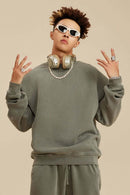Washed Fleece-Lined Relaxed Crew-Neck Sweatshirt in Grayish Green - three-quarter front modeled view