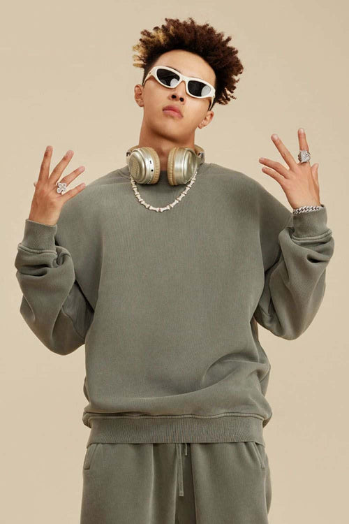 Washed Fleece-Lined Relaxed Crew-Neck Sweatshirt in Grayish Green - three-quarter front modeled view