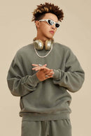 Washed Fleece-Lined Relaxed Crew-Neck Sweatshirt in Grayish Green - three-quarter front modeled view