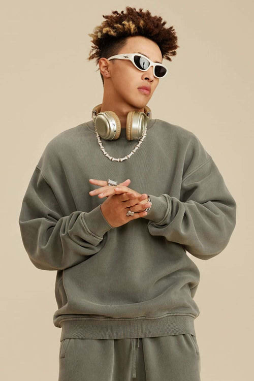 Washed Fleece-Lined Relaxed Crew-Neck Sweatshirt in Grayish Green - three-quarter front modeled view