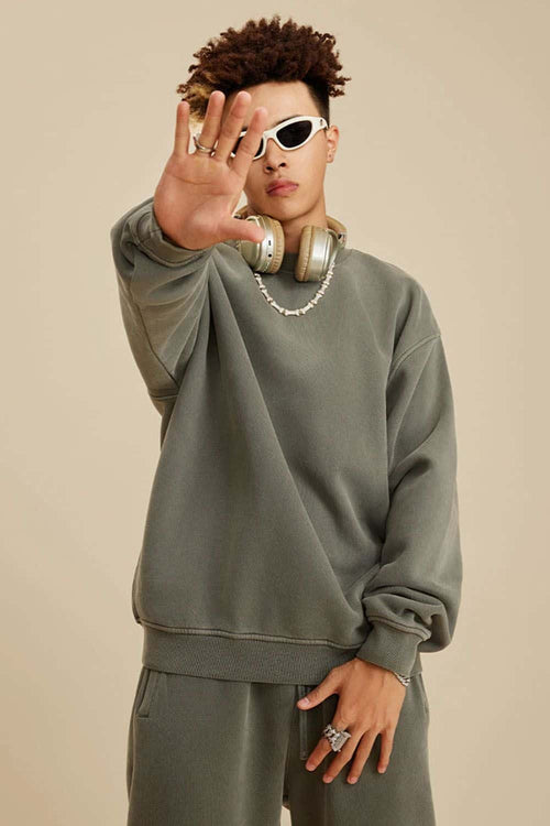Washed Fleece-Lined Relaxed Crew-Neck Sweatshirt in Grayish Green - three-quarter front modeled view