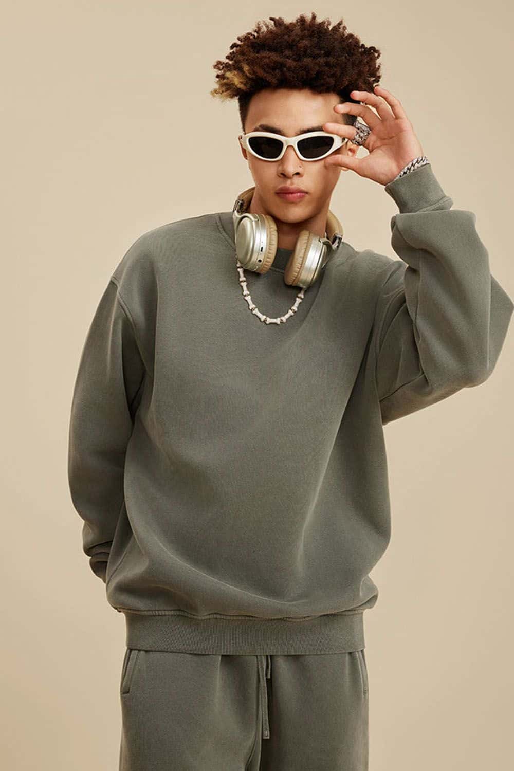 Washed Fleece-Lined Relaxed Crew-Neck Sweatshirt in Grayish Green - three-quarter front modeled view