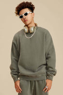 Washed Fleece-Lined Relaxed Crew-Neck Sweatshirt in Grayish Green - three-quarter front modeled view