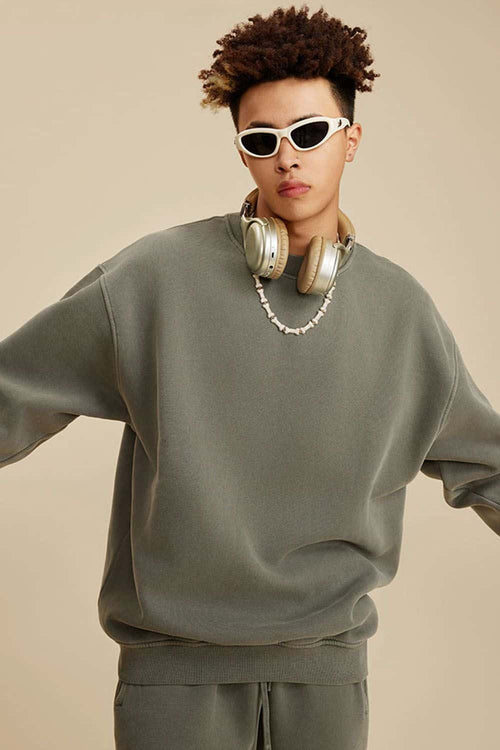 Washed Fleece-Lined Relaxed Crew-Neck Sweatshirt in Grayish Green - three-quarter front modeled view