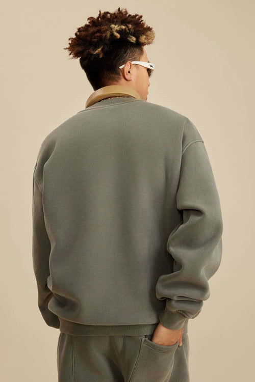 Washed Fleece-Lined Relaxed Crew-Neck Sweatshirt in Grayish Green - back modeled view