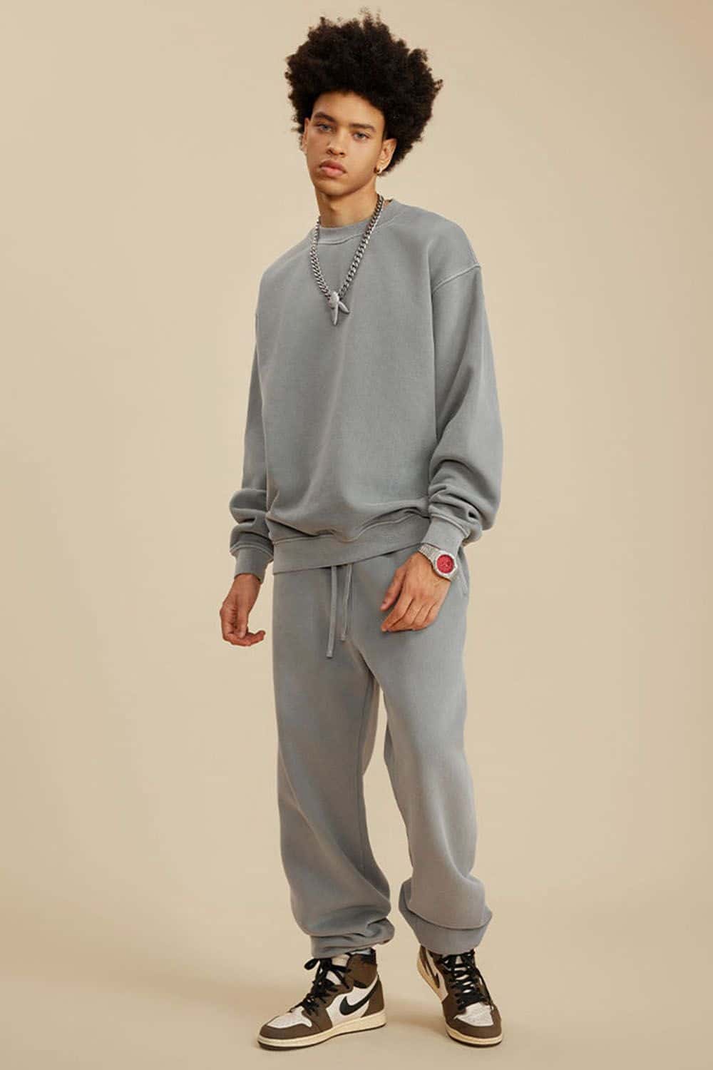 Washed Fleece-Lined Relaxed Crew-Neck Sweatshirt in Medium Gray - full-length front modeled view