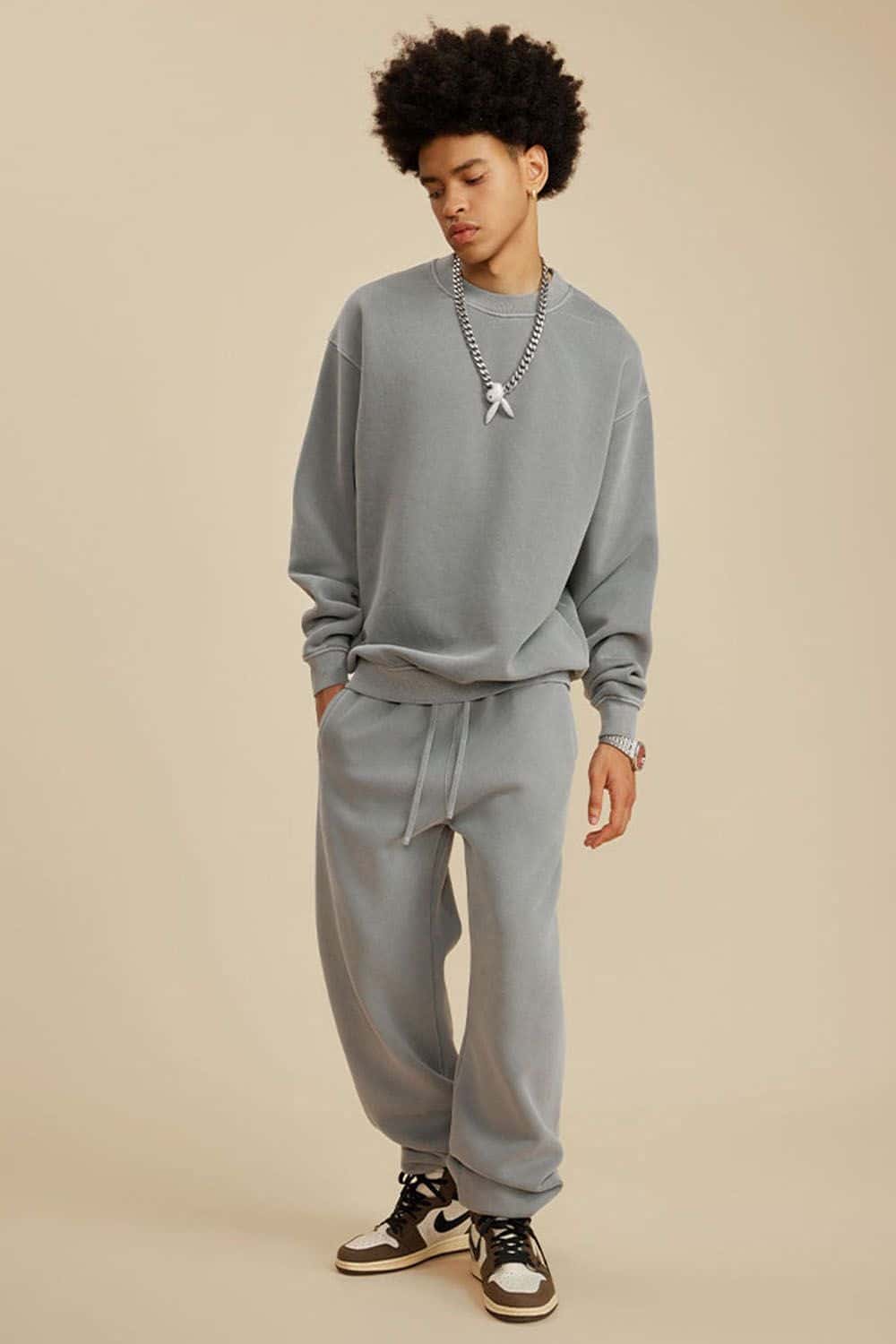 Washed Fleece-Lined Relaxed Crew-Neck Sweatshirt in Medium Gray - full-length front modeled view
