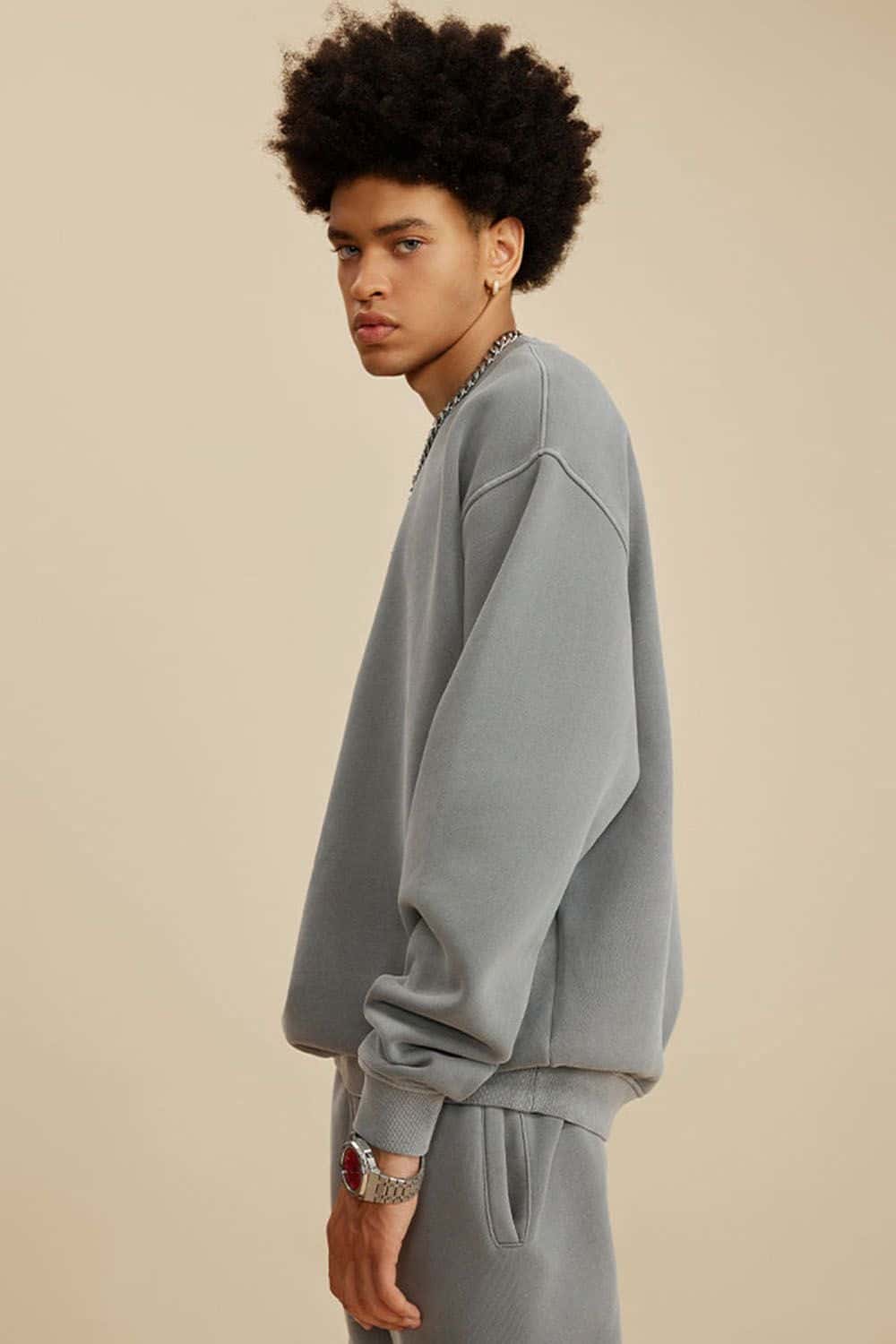 Washed Fleece-Lined Relaxed Crew-Neck Sweatshirt in Medium Gray - side modeled view