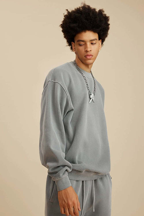 Washed Fleece-Lined Relaxed Crew-Neck Sweatshirt in Medium Gray - side modeled view