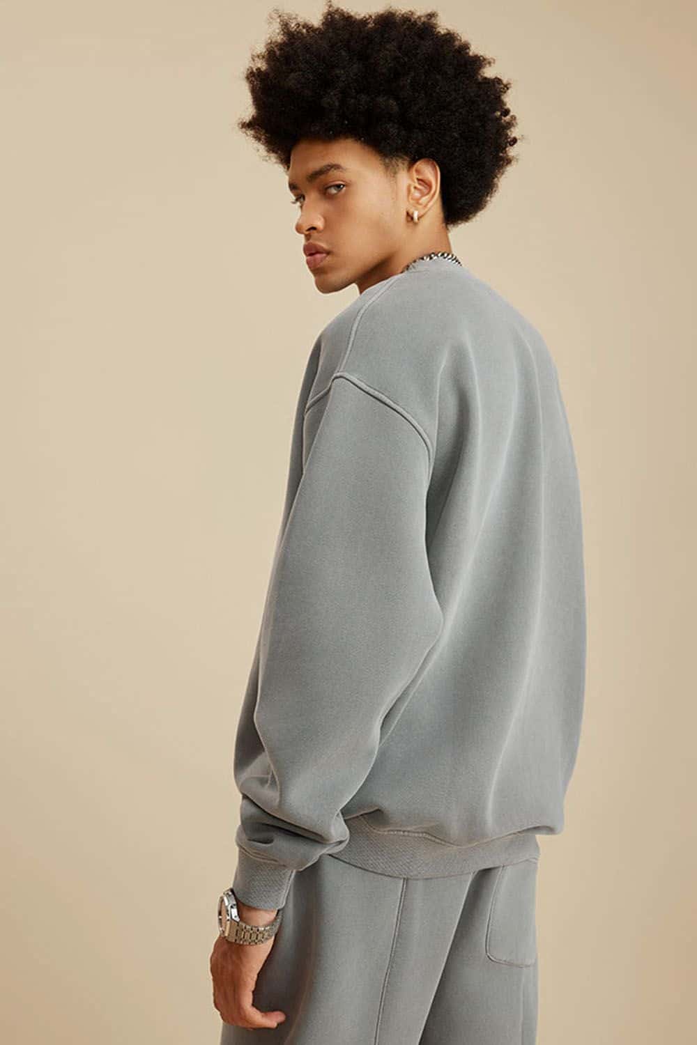 Washed Fleece-Lined Relaxed Crew-Neck Sweatshirt in Medium Gray - back modeled view