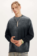 Washed Drop-Shoulder Long-Sleeve Cotton T-Shirt in Black - front modeled close-up
