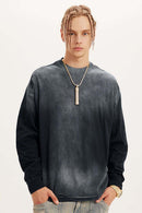Washed Drop-Shoulder Long-Sleeve Cotton T-Shirt in Black - front modeled close-up
