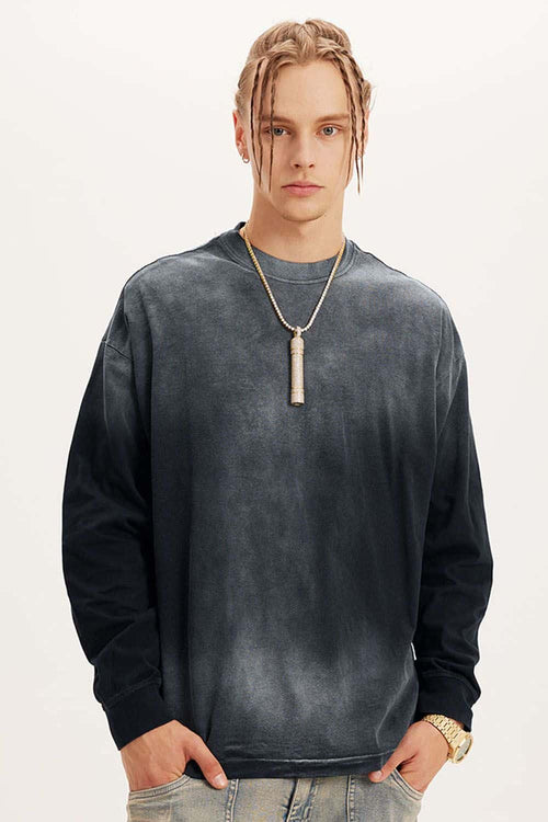 Washed Drop-Shoulder Long-Sleeve Cotton T-Shirt in Black - front modeled close-up