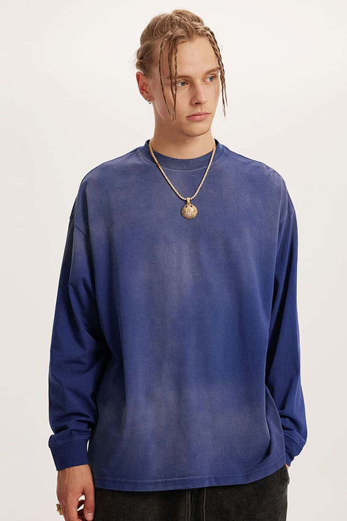 Washed Drop-Shoulder Long-Sleeve Cotton T-Shirt in Blue - front modeled close-up