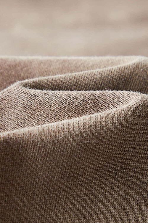Washed Drop-Shoulder Long-Sleeve Cotton T-Shirt in Coffee - fabric texture close-up