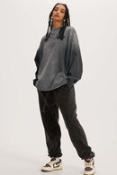 Washed Drop-Shoulder Long-Sleeve Cotton T-Shirt in Gray - full-length front modeled view