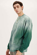 Washed Drop-Shoulder Long-Sleeve Cotton T-Shirt in Green - front modeled view